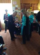 Cheri handing out shoe stickers